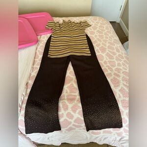 Lot of women’s set turtleneck and pants . Maybe Halloween outfit ?